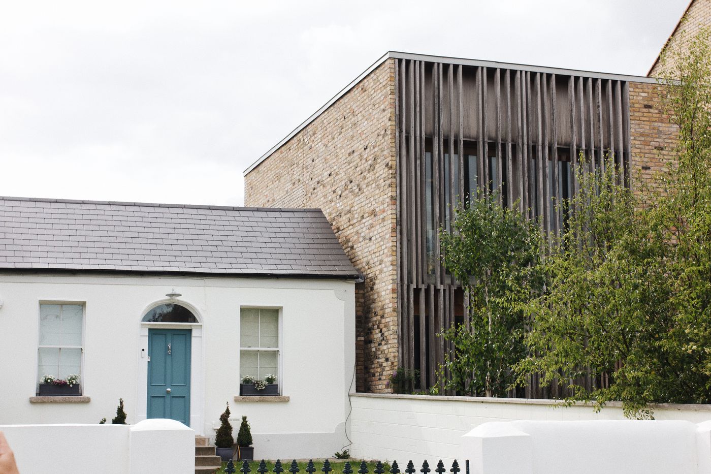 Contemporary house exterior with a well-kept entrance